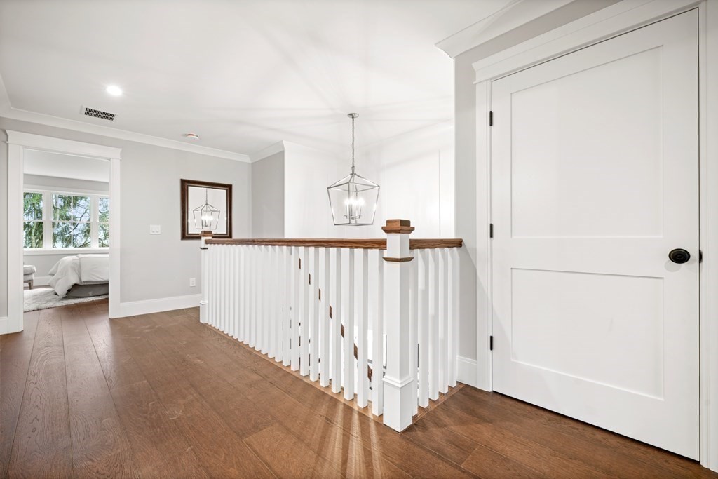 5 Wayside Road Natick, MA 01760 - Photo 26 of 29 wooden floor in a hall with an entryway and a window