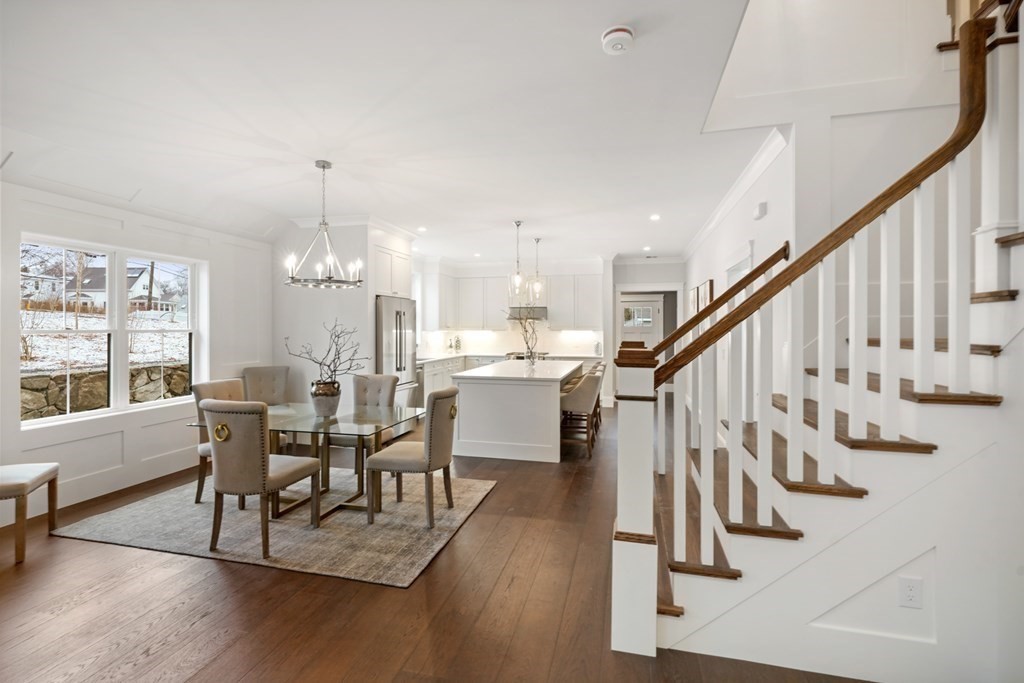 5 Wayside Road Natick, MA 01760 - Photo 6 of 29 a dining room with wooden floor table and chairs