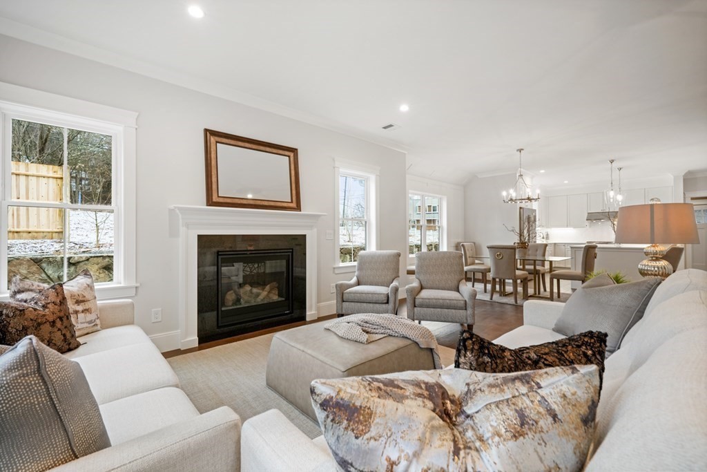 5 Wayside Road Natick, MA 01760 - Photo 7 of 29 a living room with furniture and a fireplace