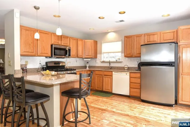 a view of a hallway with windows