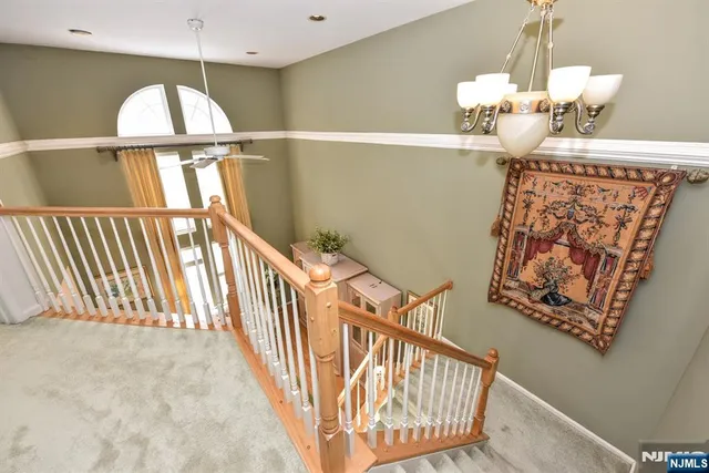 a living room with furniture and windows