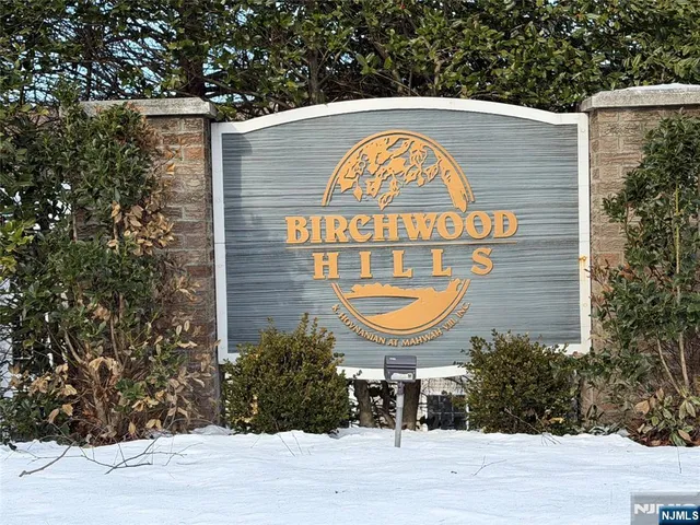 a view of a house with a swimming pool