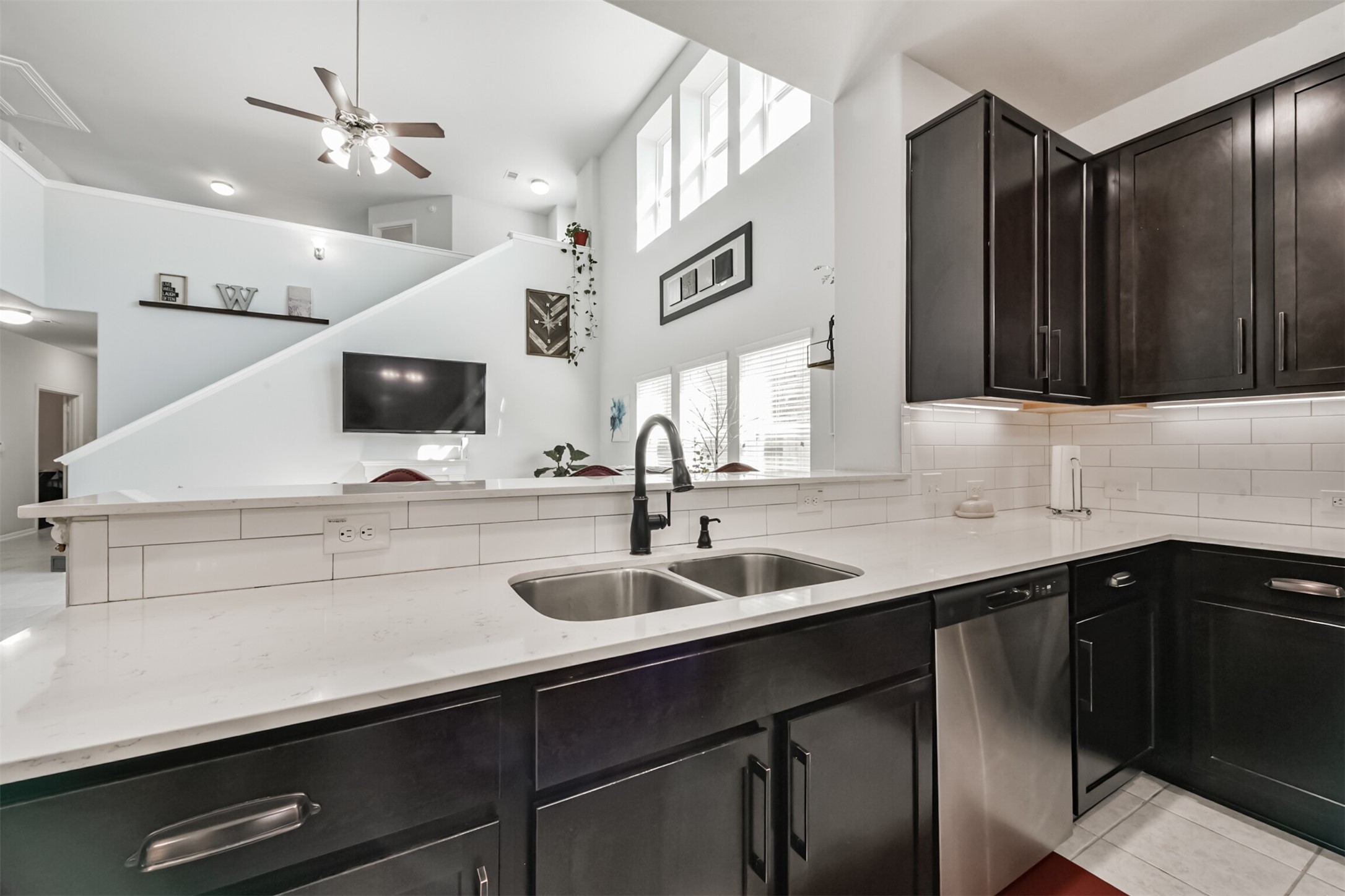 10018 Chase Court Baytown, TX 77521 - Photo 16 of 46 a kitchen with a sink and cabinets