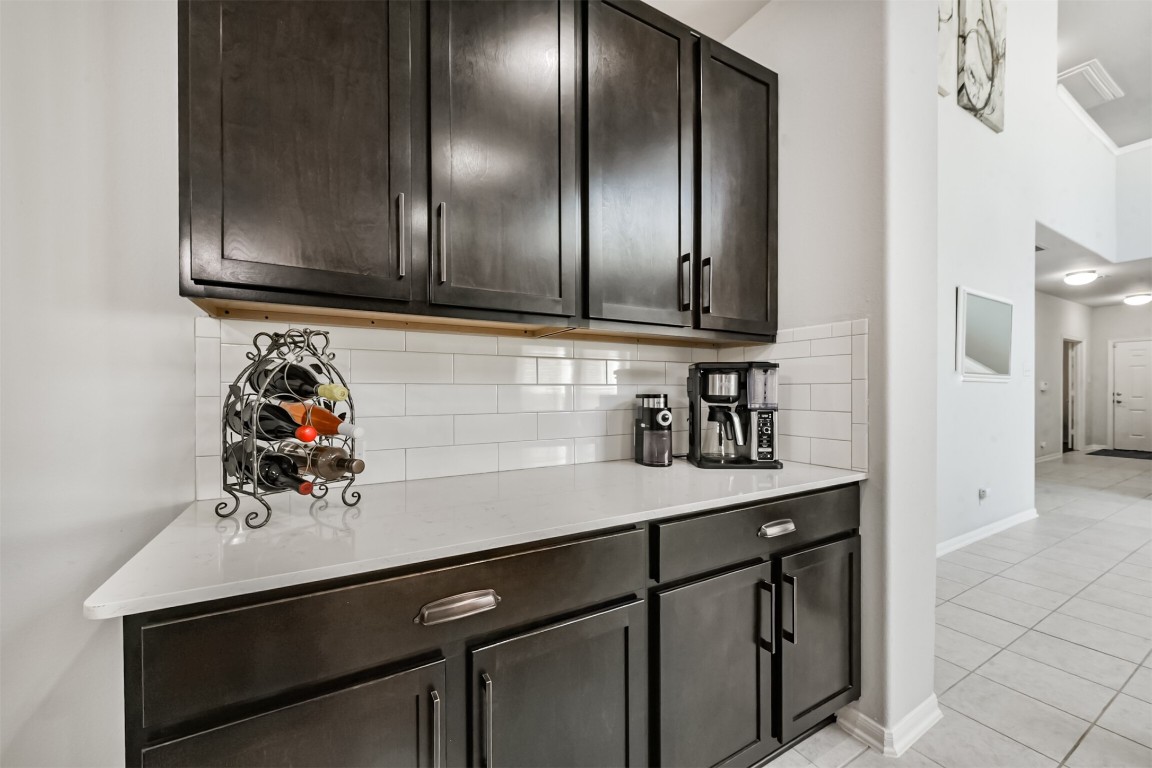 10018 Chase Court Baytown, TX 77521 - Photo 17 of 46 a kitchen with a sink and cabinets