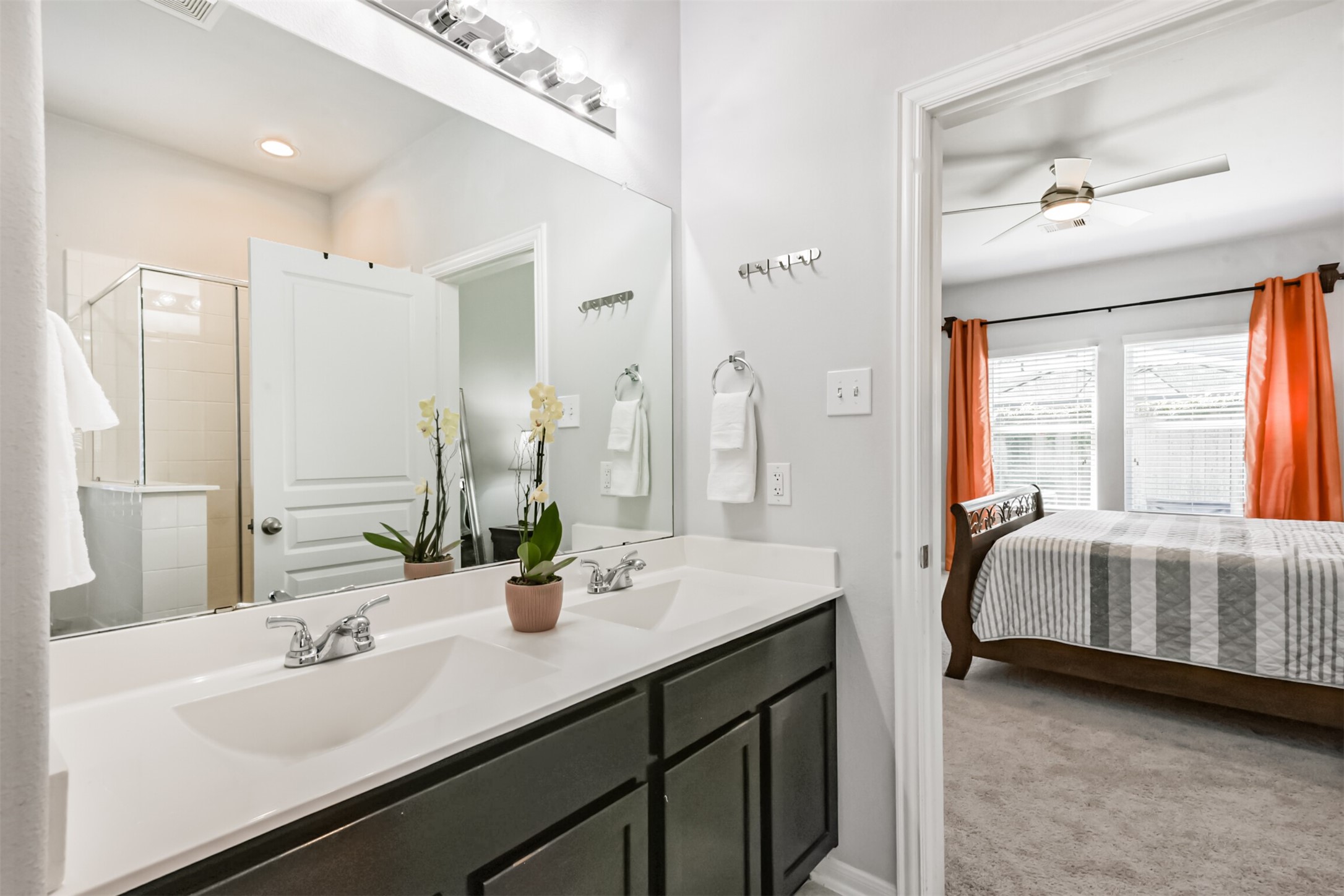 10018 Chase Court Baytown, TX 77521 - Photo 23 of 46 a bathroom with a double vanity sink mirror and double