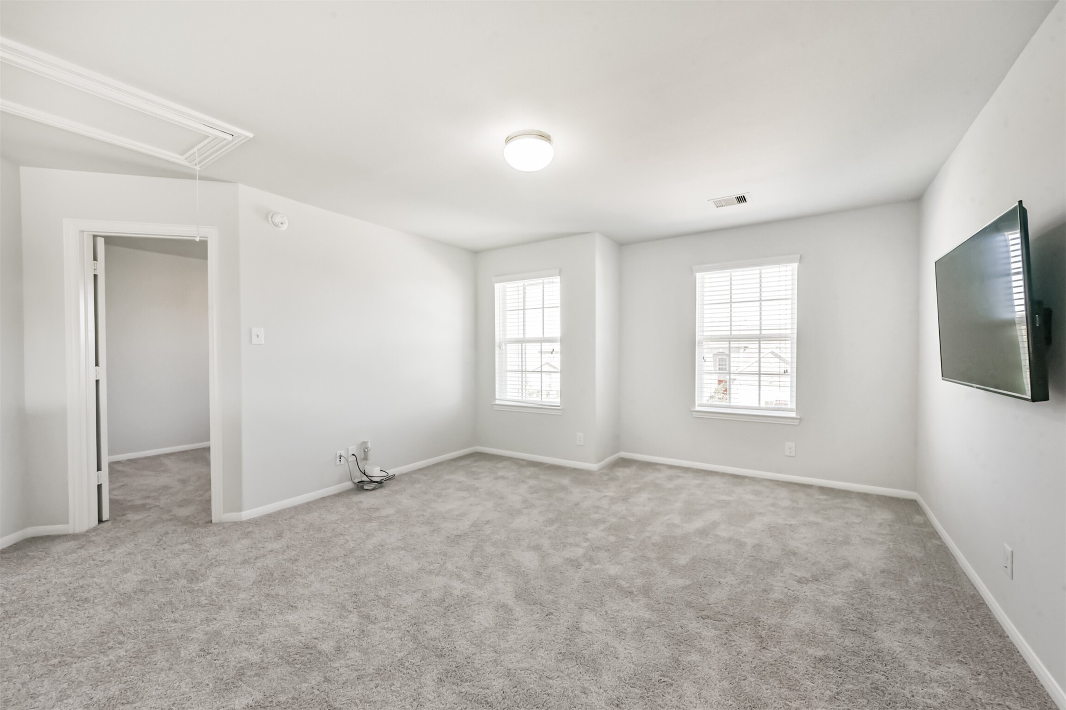 10018 Chase Court Baytown, TX 77521 - Photo 26 of 46 a view of an empty room with a window