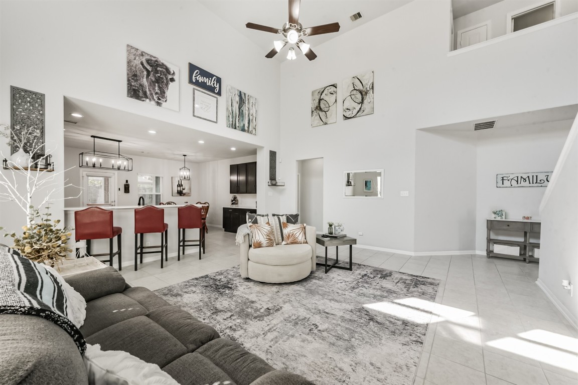 10018 Chase Court Baytown, TX 77521 - Photo 10 of 46 a living room with furniture and a dining table