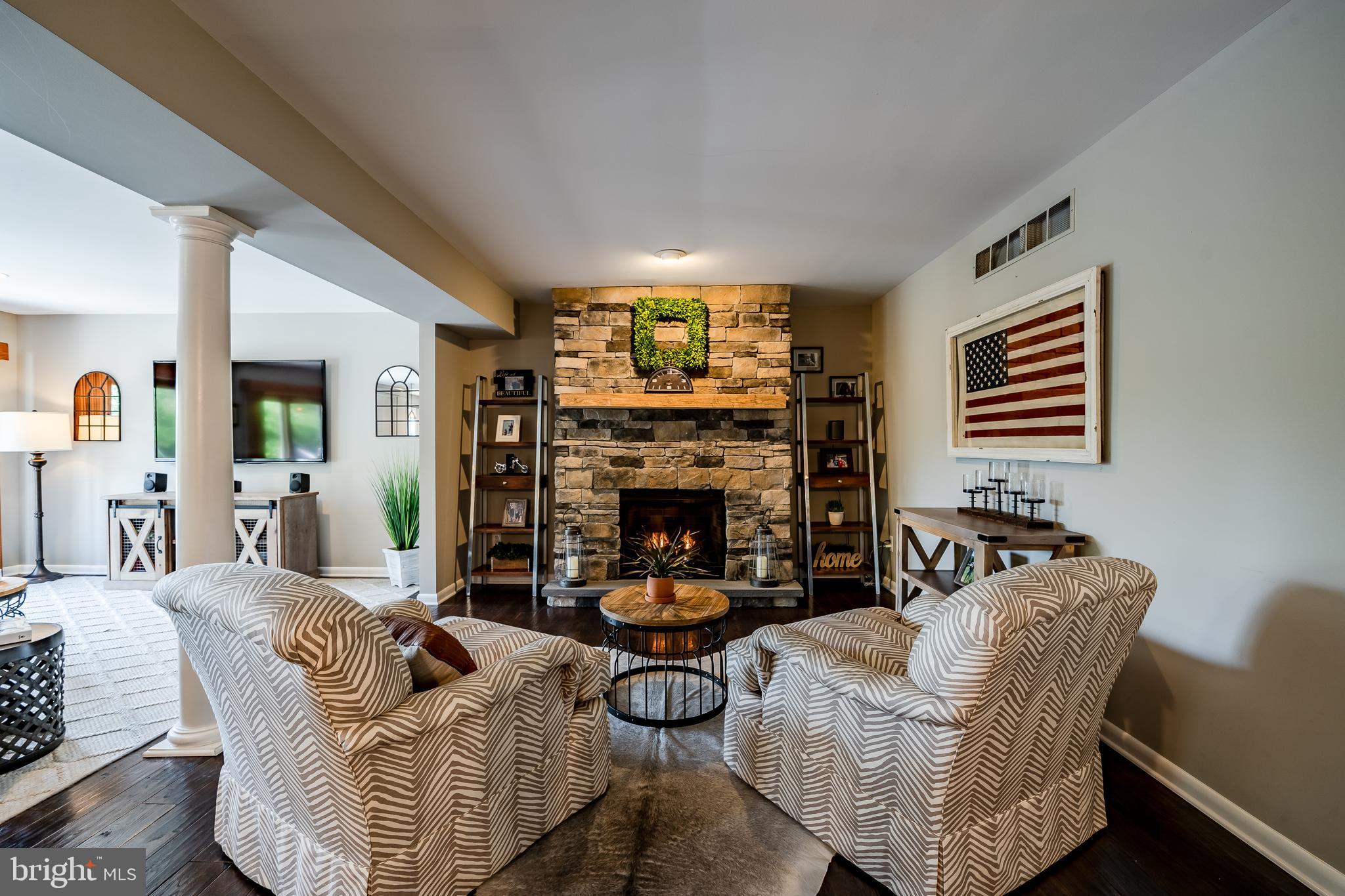 9 Pine Street Newtown Square, PA 19073 - Photo 11 of 54 Surrounded by a beautiful stone mantle