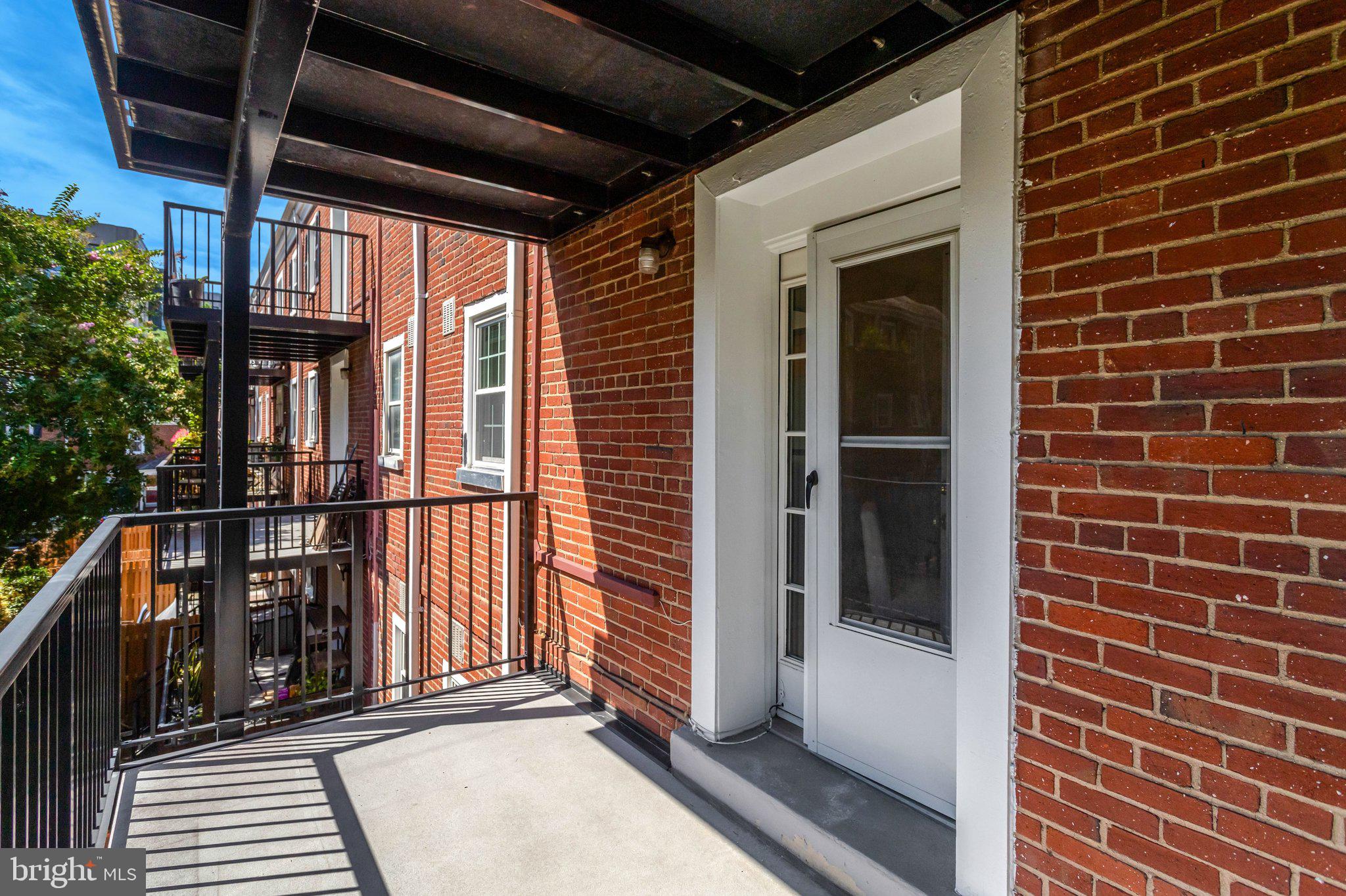 4900 29th Road South, Unit B1 Arlington, VA 22206 - Photo 24 of 56 Private balcony overlooking the courtyard.