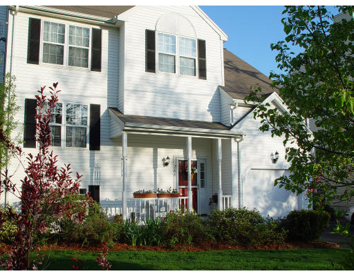 264 Hillside Road North Andover, MA 01845 - Photo 1 of 1 a front view of a house with a garden