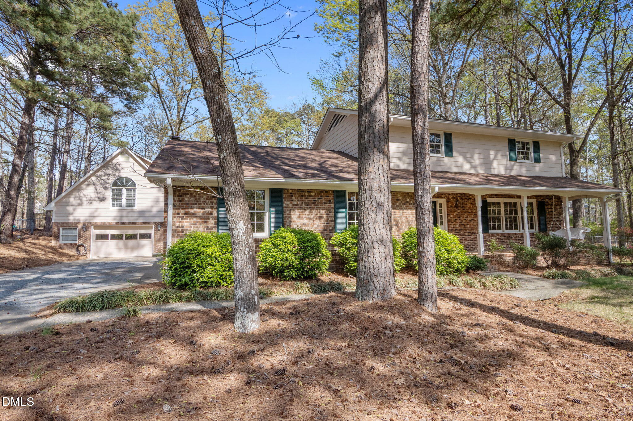 2421 Bonnie Brae Road Durham, NC 27703 - Photo 1 of 55 a front view of a house with garden and porch