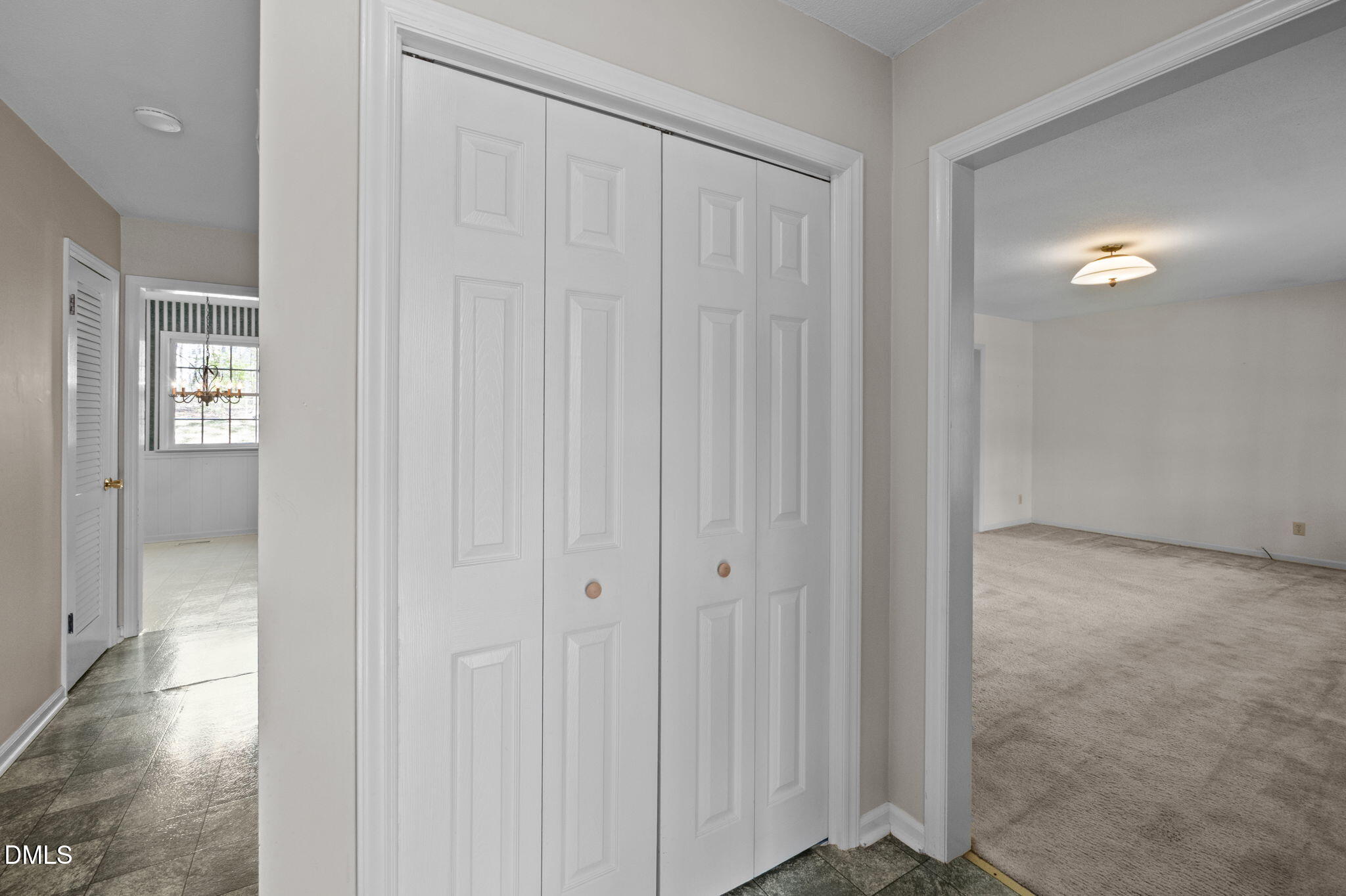 2421 Bonnie Brae Road Durham, NC 27703 - Photo 12 of 55 a view of a hallway with wooden floor