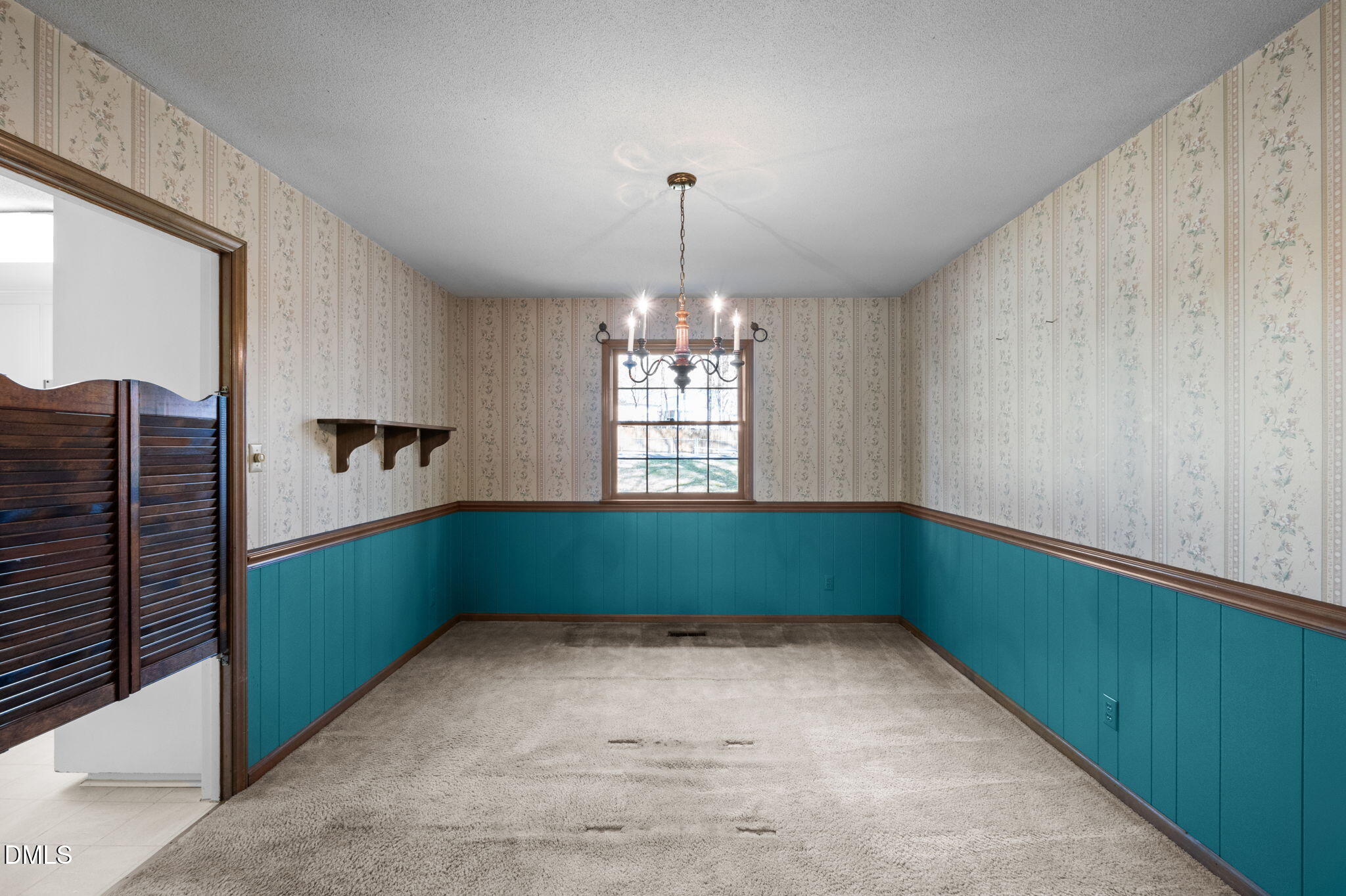 2421 Bonnie Brae Road Durham, NC 27703 - Photo 14 of 55 a room with window and stairs
