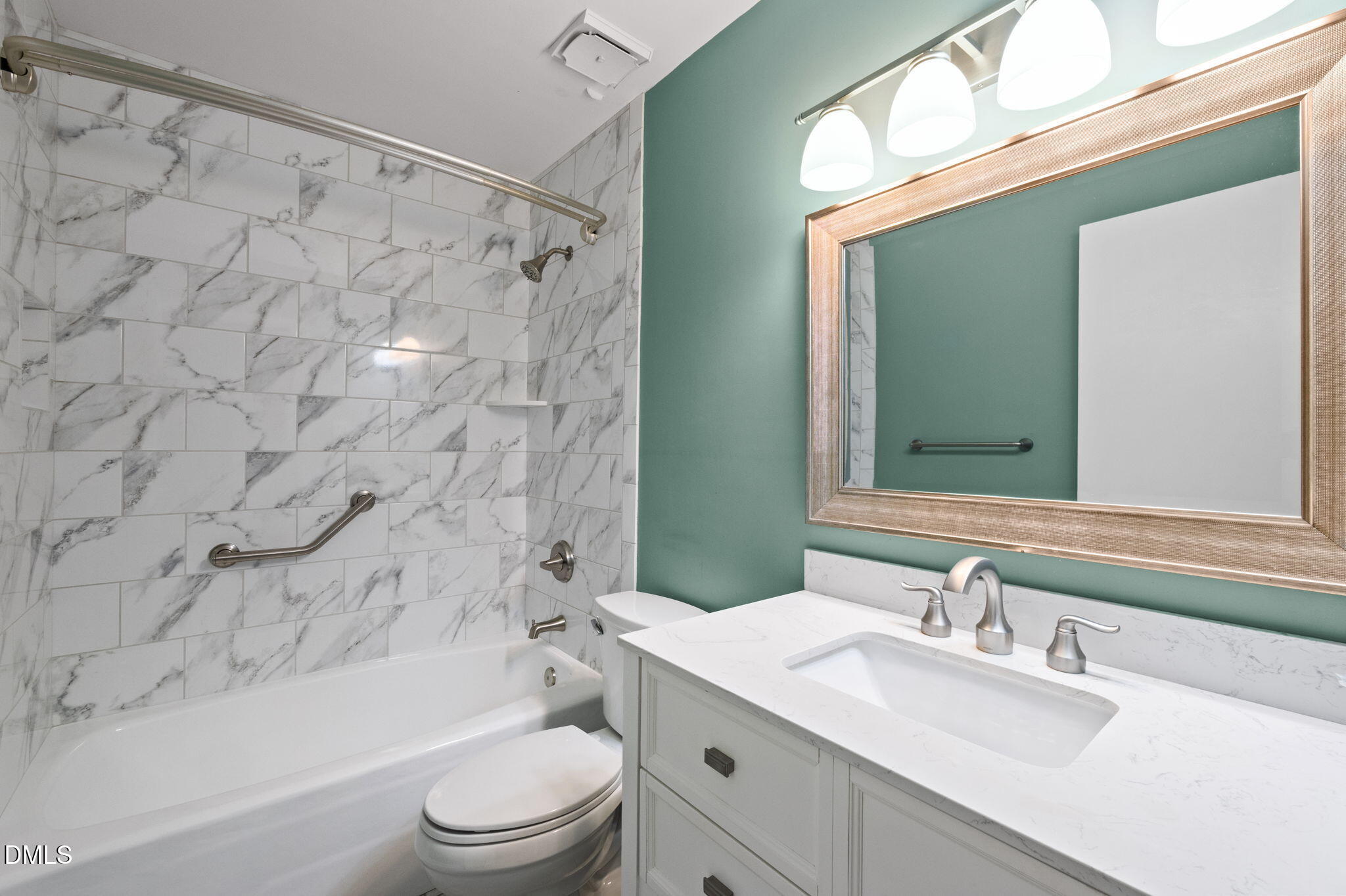 2421 Bonnie Brae Road Durham, NC 27703 - Photo 27 of 55 a bathroom with a sink toilet and shower