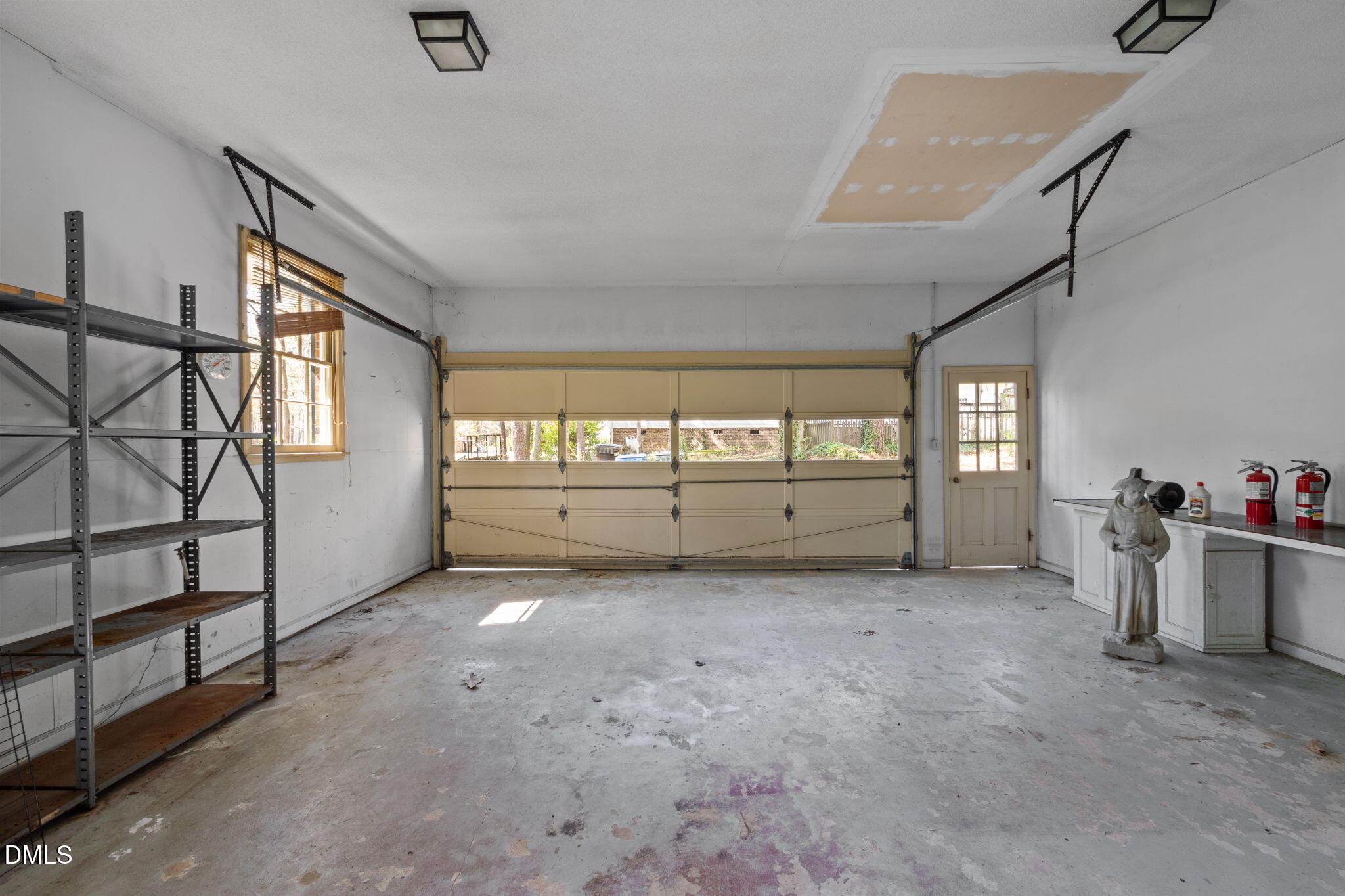 2421 Bonnie Brae Road Durham, NC 27703 - Photo 32 of 55 a view of an empty room with a window