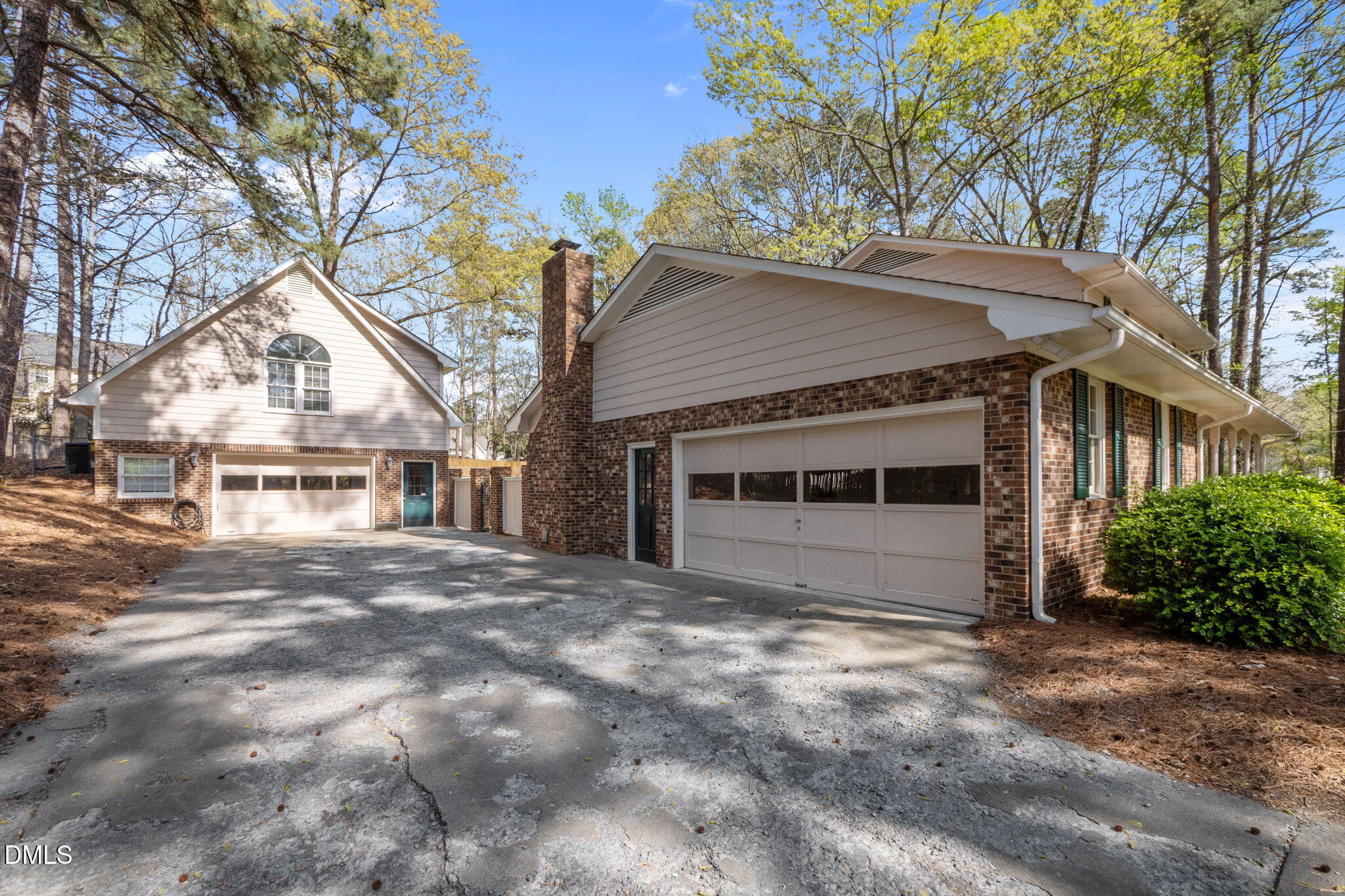 2421 Bonnie Brae Road Durham, NC 27703 - Photo 33 of 55 a front view of a house with a yard and garage