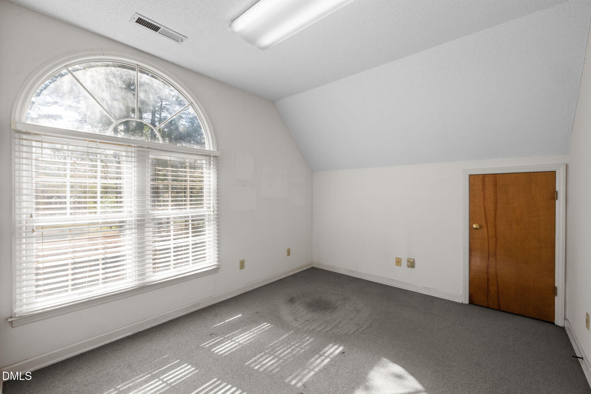 2421 Bonnie Brae Road Durham, NC 27703 - Photo 36 of 55 an empty room with windows