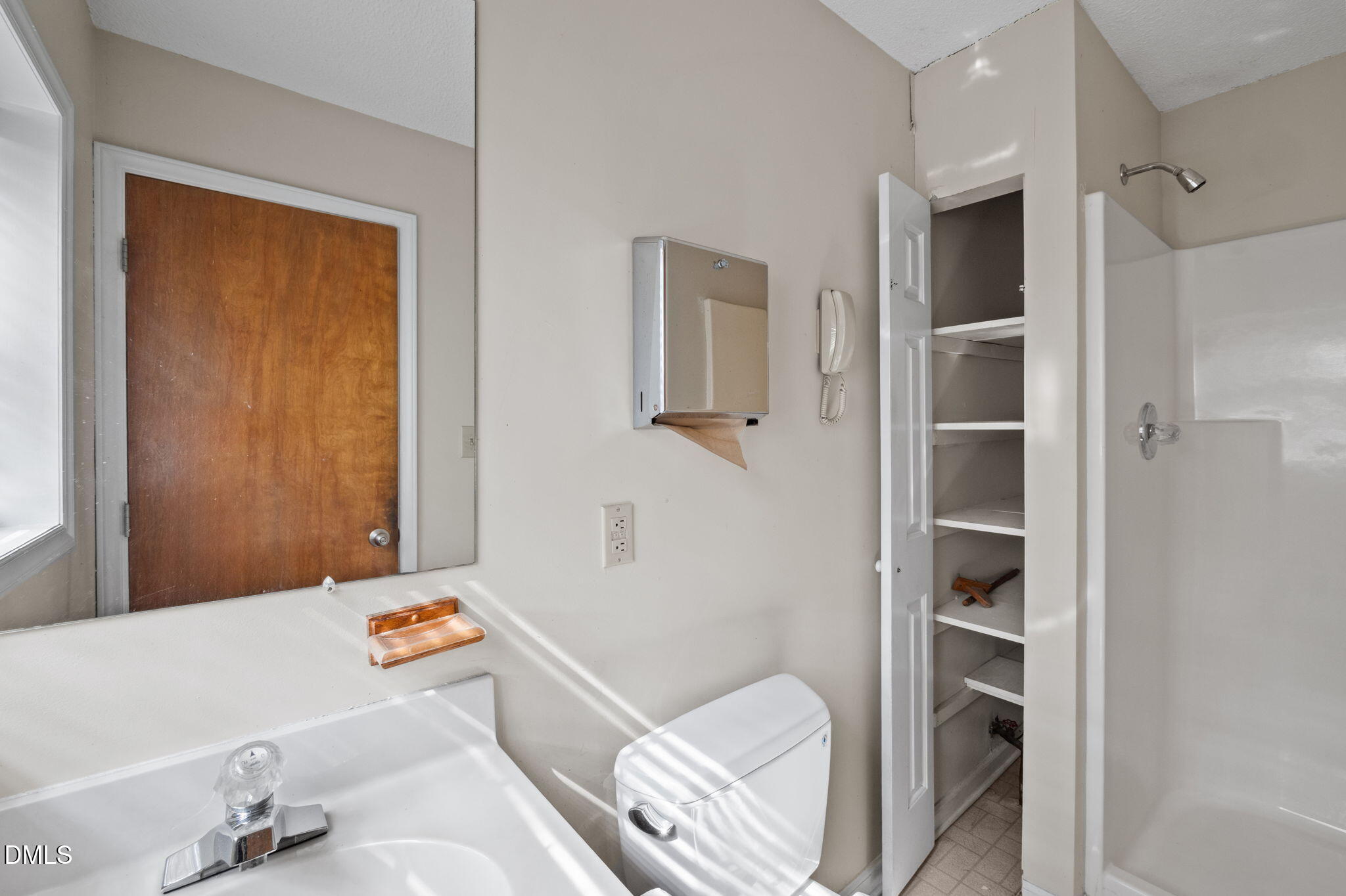 2421 Bonnie Brae Road Durham, NC 27703 - Photo 38 of 55 a bathroom with a tub and shower