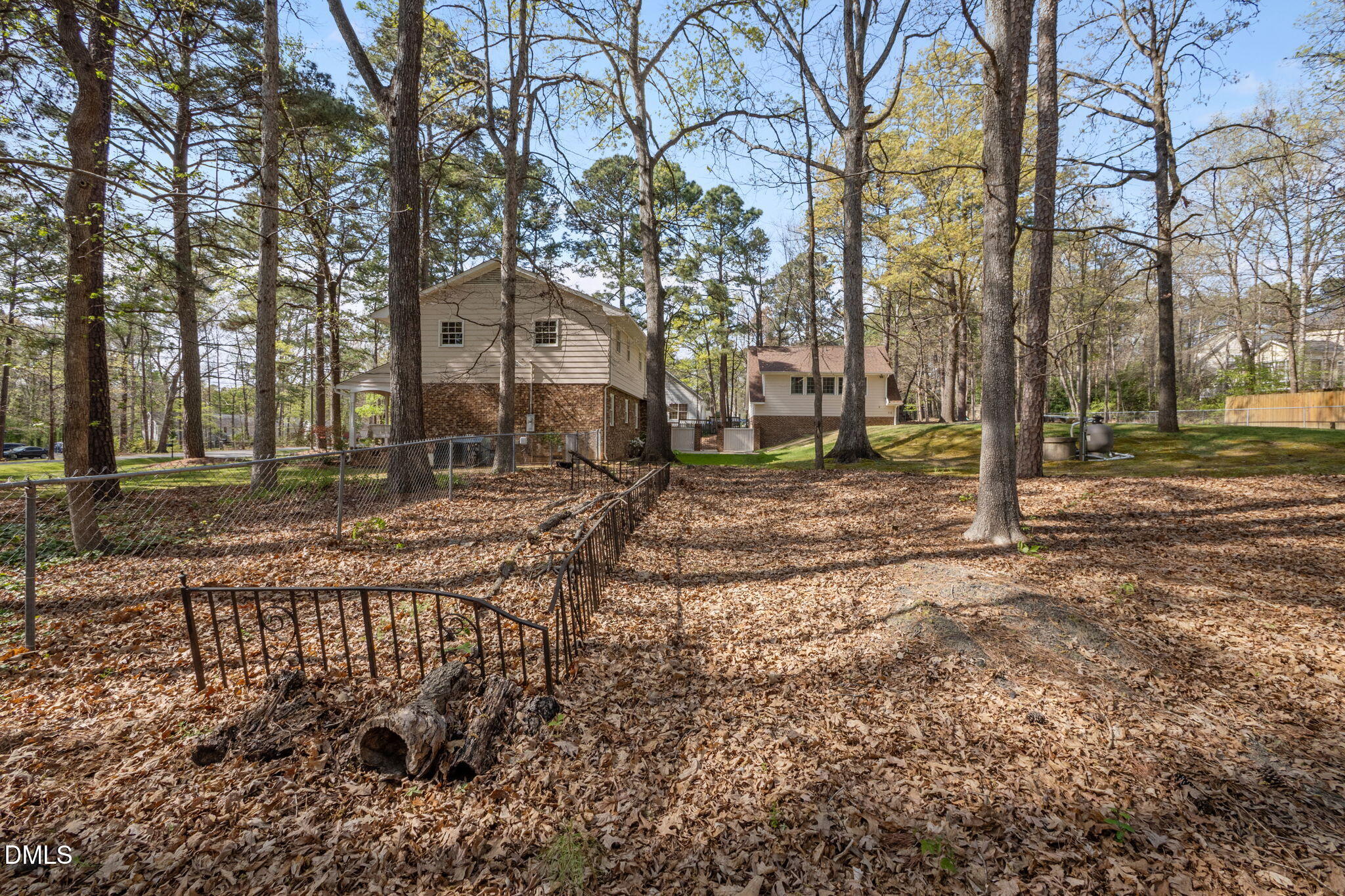 2421 Bonnie Brae Road Durham, NC 27703 - Photo 42 of 55 a backyard of a house with lots of green space