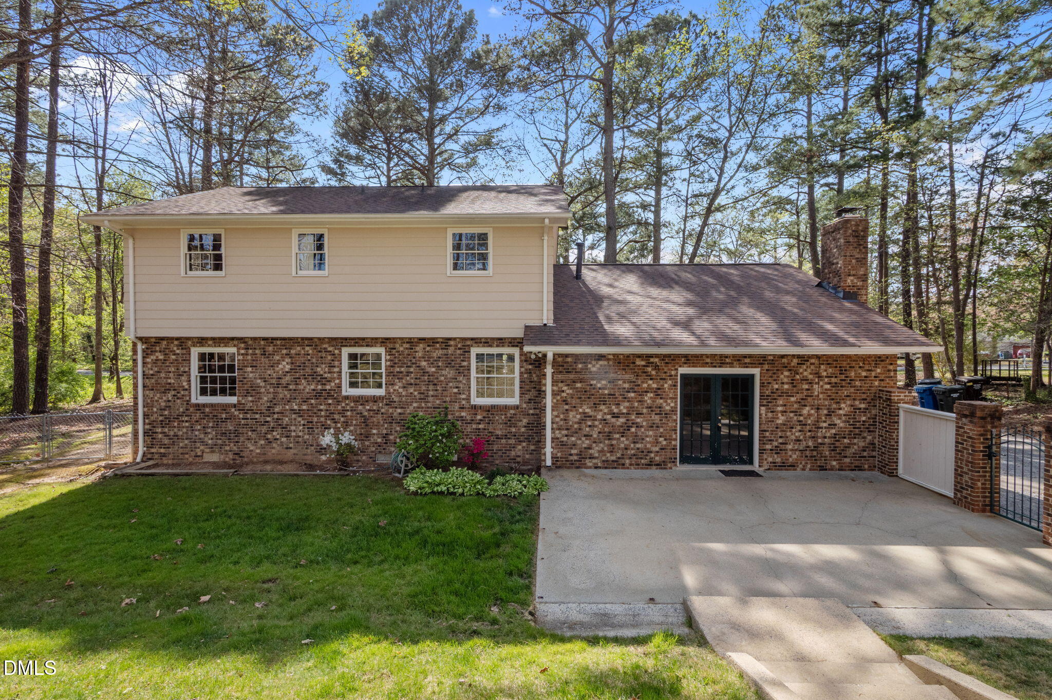 2421 Bonnie Brae Road Durham, NC 27703 - Photo 46 of 55 a view of a house with a yard and a large tree