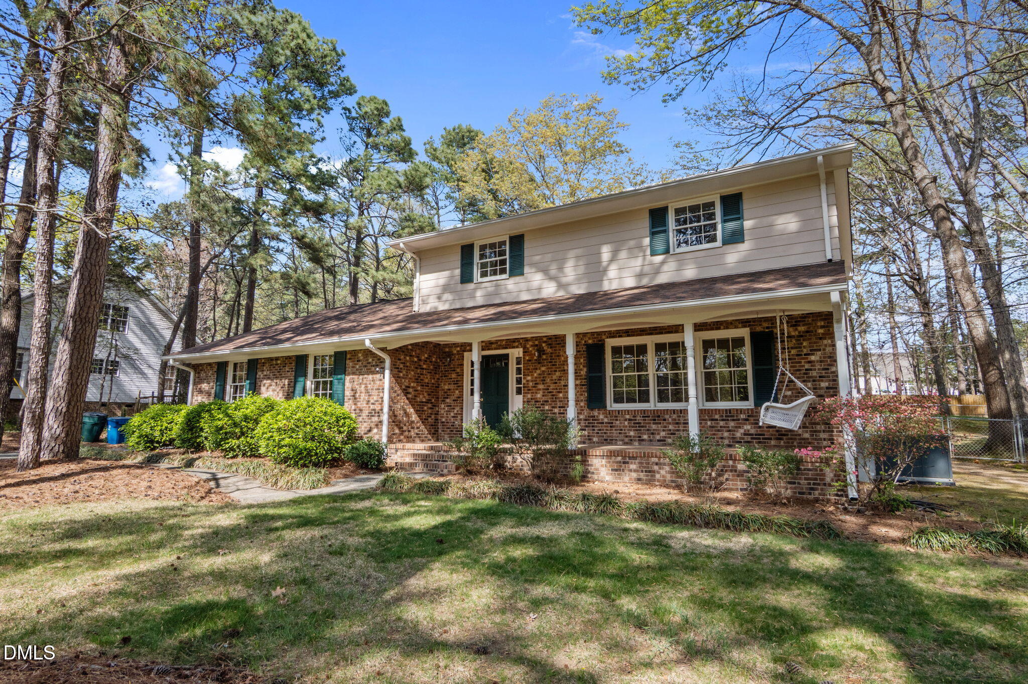 2421 Bonnie Brae Road Durham, NC 27703 - Photo 6 of 55 a front view of a house with garden
