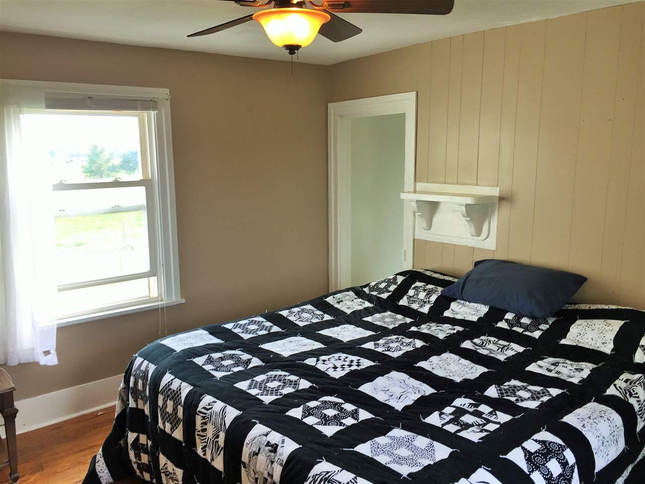 4274 Rockfish Road Grottoes, VA 24441 - Photo 30 of 41 a bedroom with a bed and a window