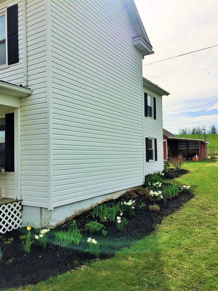 4274 Rockfish Road Grottoes, VA 24441 - Photo 4 of 41 a front view of a house with garden