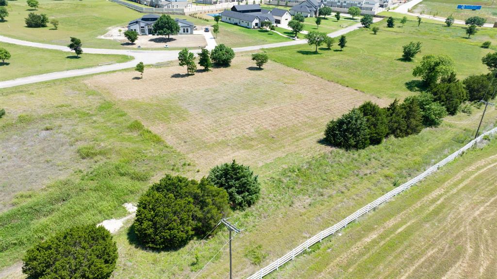 91 Country Rdg Road Melissa, TX 75454 - Photo 1 of 18 a view of a swimming pool with a yard