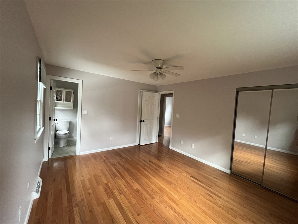 27 Miles Standish Drive, Unit 27 Marlborough, MA 01752 - Photo 14 of 22 a view of empty room with wooden floor
