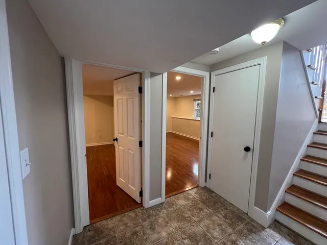wooden view of a hallway with wooden floor