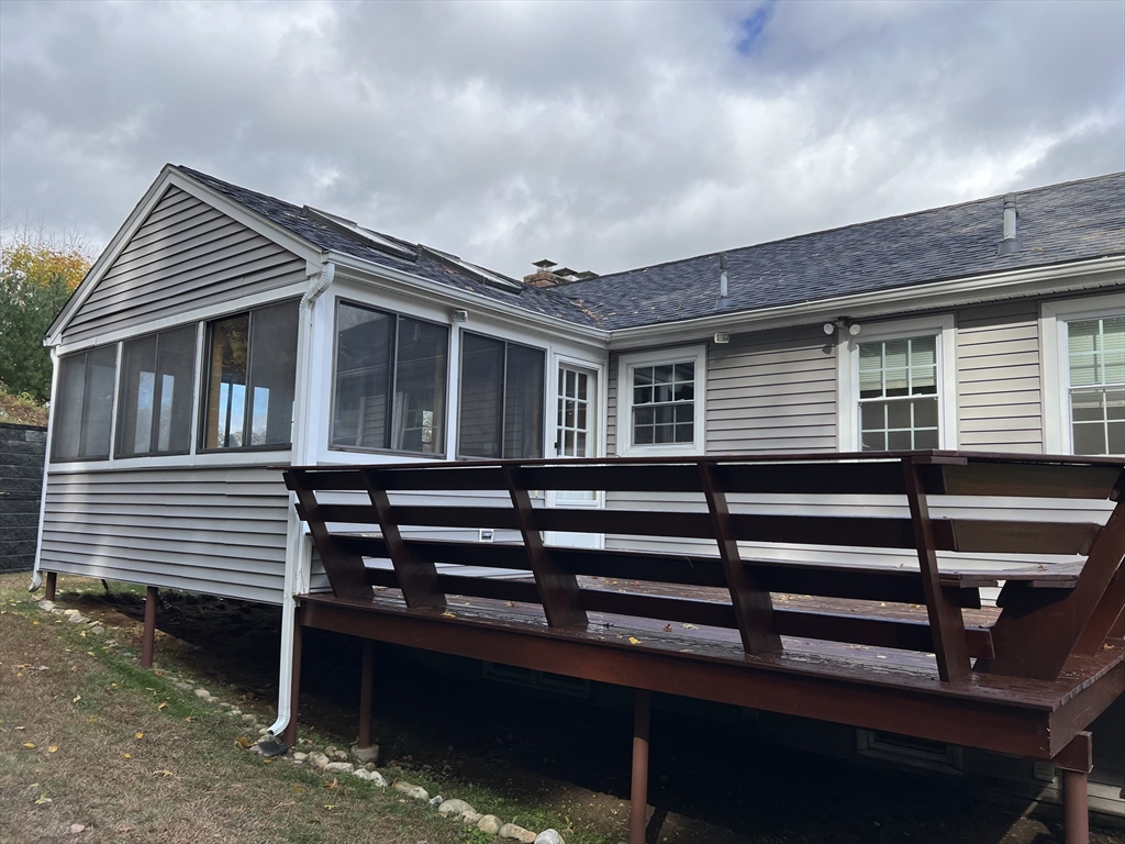 27 Miles Standish Drive, Unit 27 Marlborough, MA 01752 - Photo 3 of 22 a front view of a house with a balcony