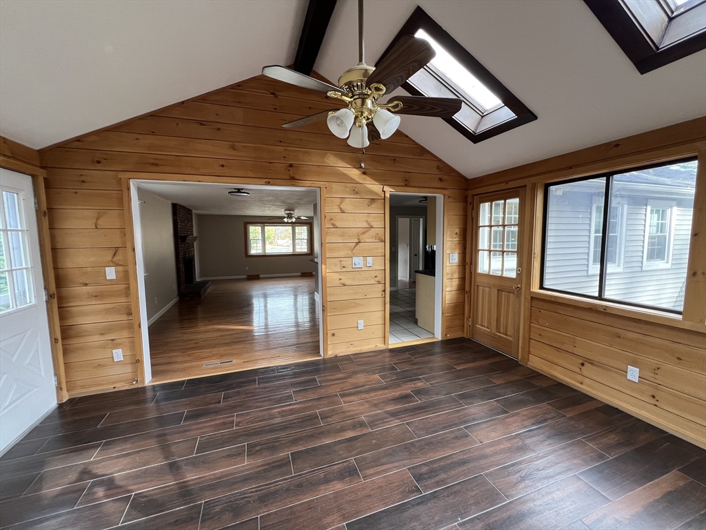 27 Miles Standish Drive, Unit 27 Marlborough, MA 01752 - Photo 7 of 22 a view of an entryway wooden floor and a kitchen