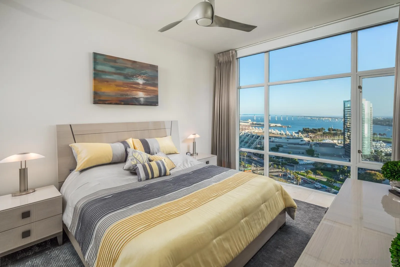 550 Front Street, Unit 1908 San Diego, CA 92101 - Photo 11 of 27 a bedroom with a bed and a view of balcony