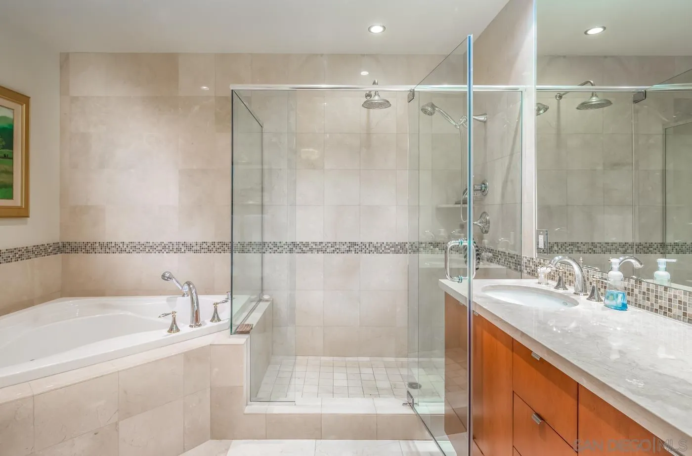 550 Front Street, Unit 1908 San Diego, CA 92101 - Photo 12 of 27 a bathroom with a granite countertop bathtub shower sink and mirror