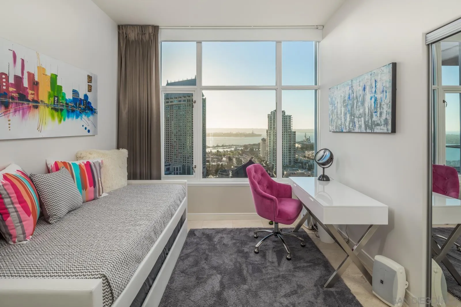 550 Front Street, Unit 1908 San Diego, CA 92101 - Photo 13 of 27 a living room with furniture and a large window