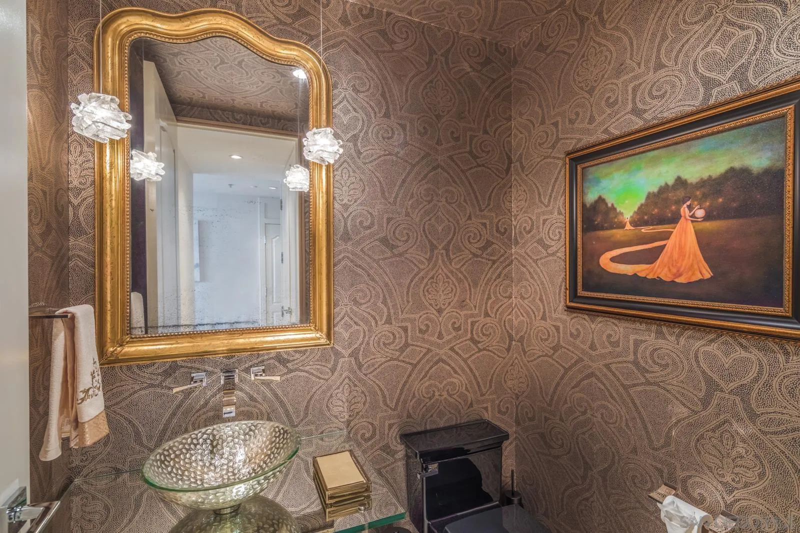 550 Front Street, Unit 1908 San Diego, CA 92101 - Photo 15 of 27 en suite bathroom with a toilet sink and mirror