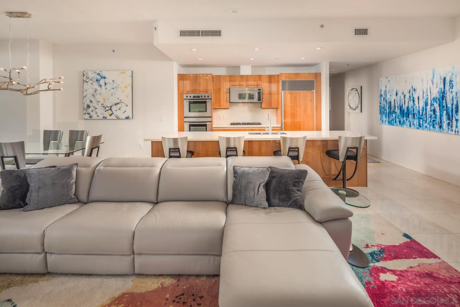 550 Front Street, Unit 1908 San Diego, CA 92101 - Photo 8 of 27 a living room with furniture and a large window