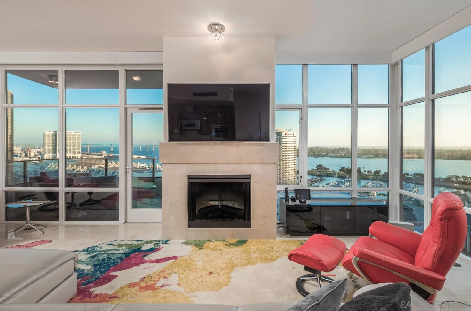 550 Front Street, Unit 1908 San Diego, CA 92101 - Photo 9 of 27 a living room with furniture and a fireplace