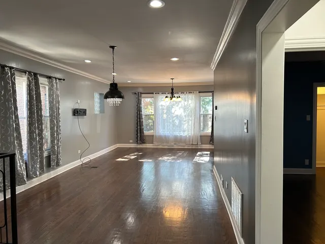 a view of gallery with wooden floor