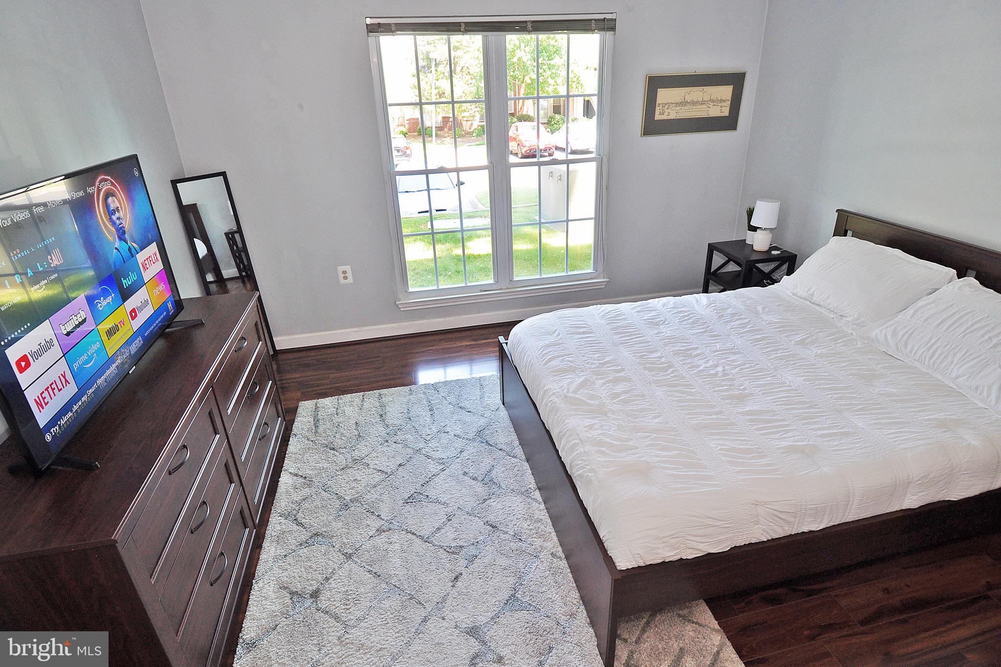 20963 Timber Ridge Terrace, Unit 101 Ashburn, VA 20147 - Photo 12 of 26 Master Bedroom