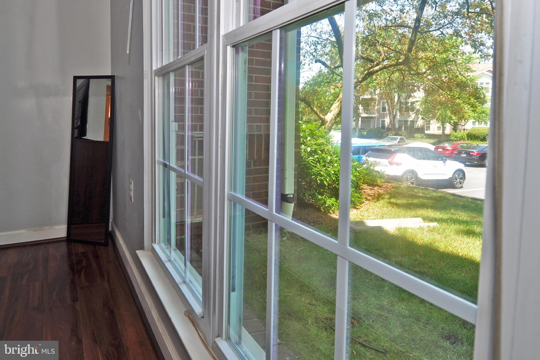 20963 Timber Ridge Terrace, Unit 101 Ashburn, VA 20147 - Photo 13 of 26 Master Bedroom Has Large Windows