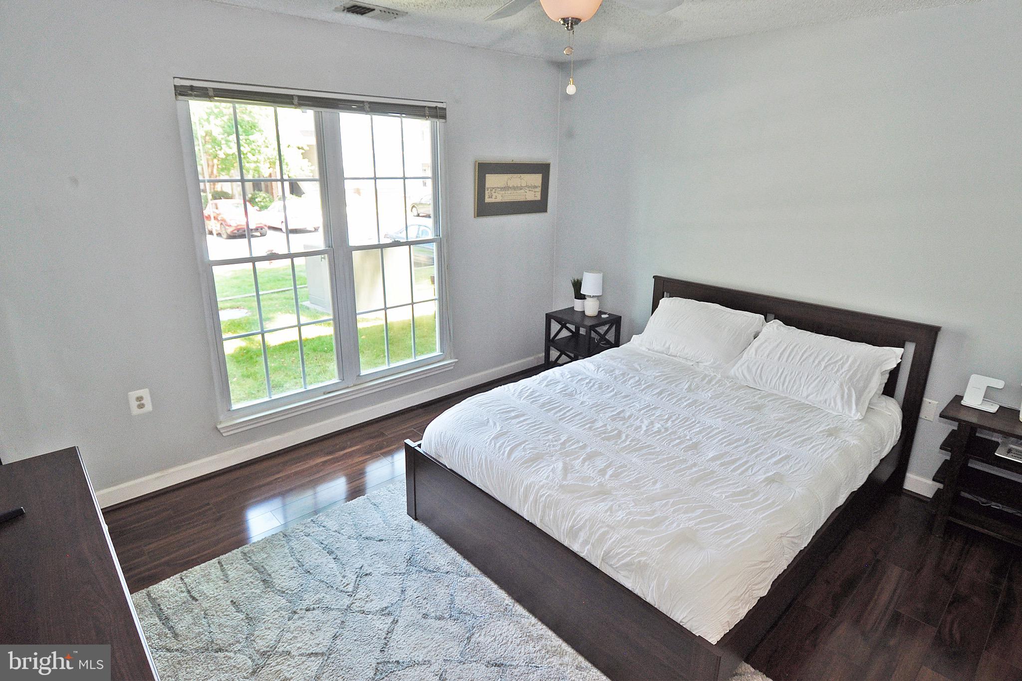 20963 Timber Ridge Terrace, Unit 101 Ashburn, VA 20147 - Photo 14 of 26 Master Bedroom