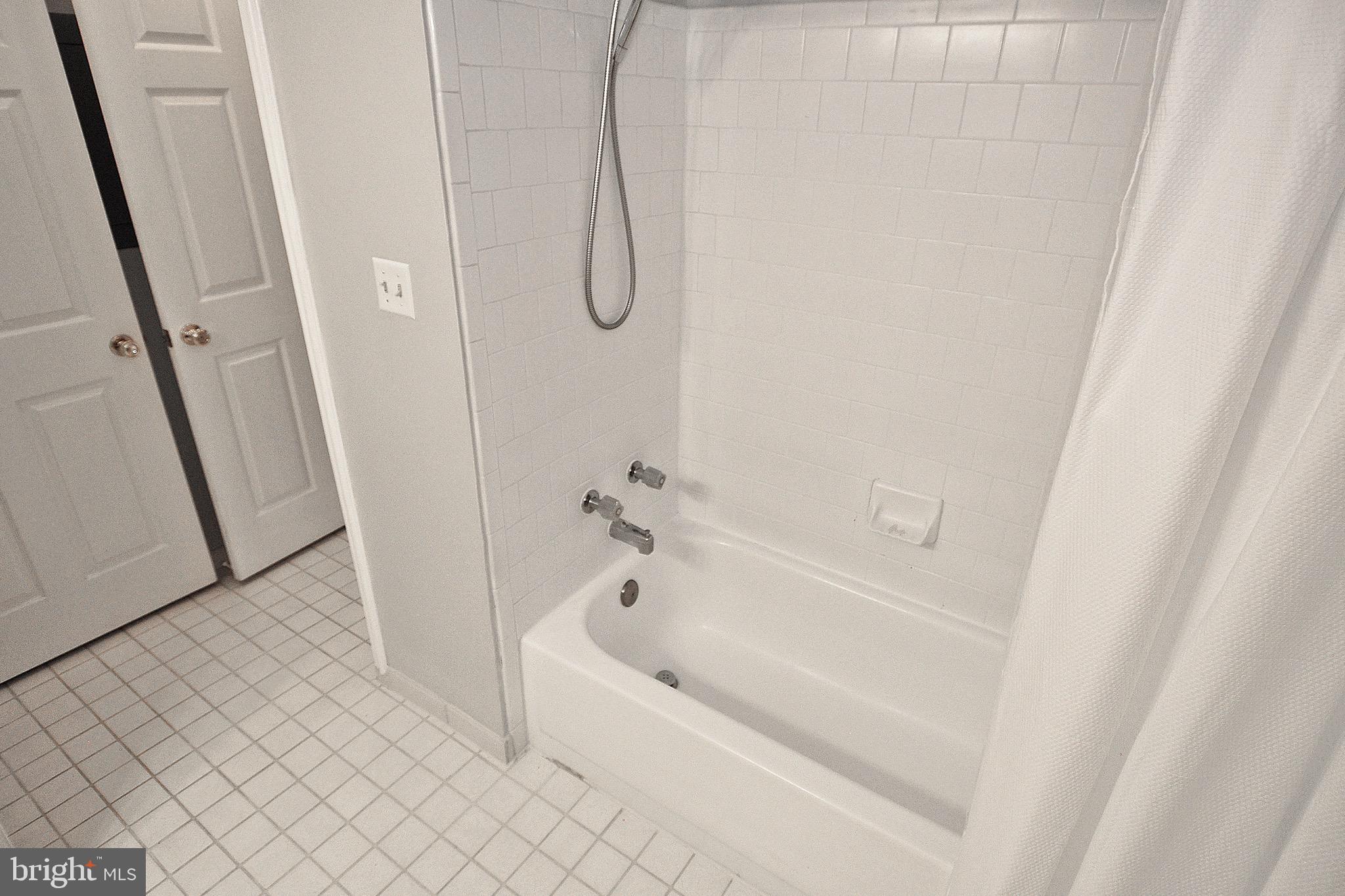 20963 Timber Ridge Terrace, Unit 101 Ashburn, VA 20147 - Photo 17 of 26 Master Bathroom