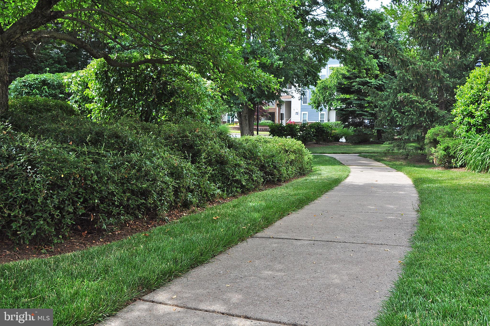 20963 Timber Ridge Terrace, Unit 101 Ashburn, VA 20147 - Photo 26 of 26 Landscaped Pathways