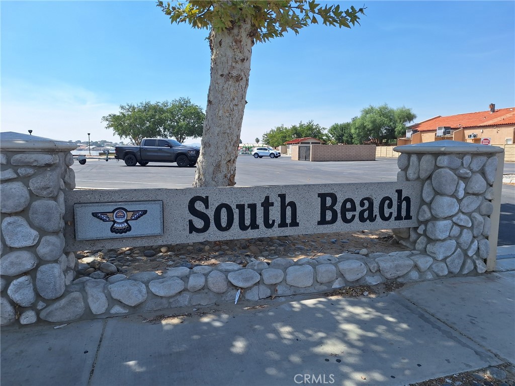14553 Rivers Edge Road Helendale, CA 92342 - Photo 11 of 15 a view of a street with a tree in front of it