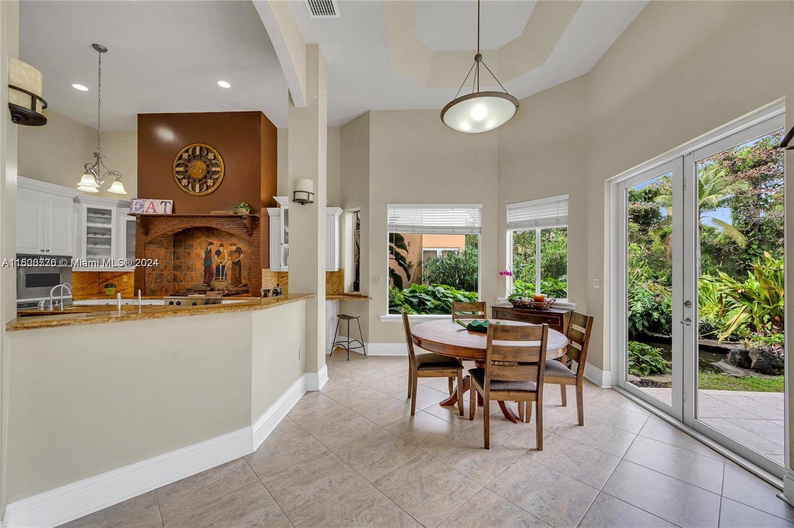 10901 Southwest 91st Street Miami, FL 33176 - Photo 11 of 69 a view of a dining room with furniture window and outside view