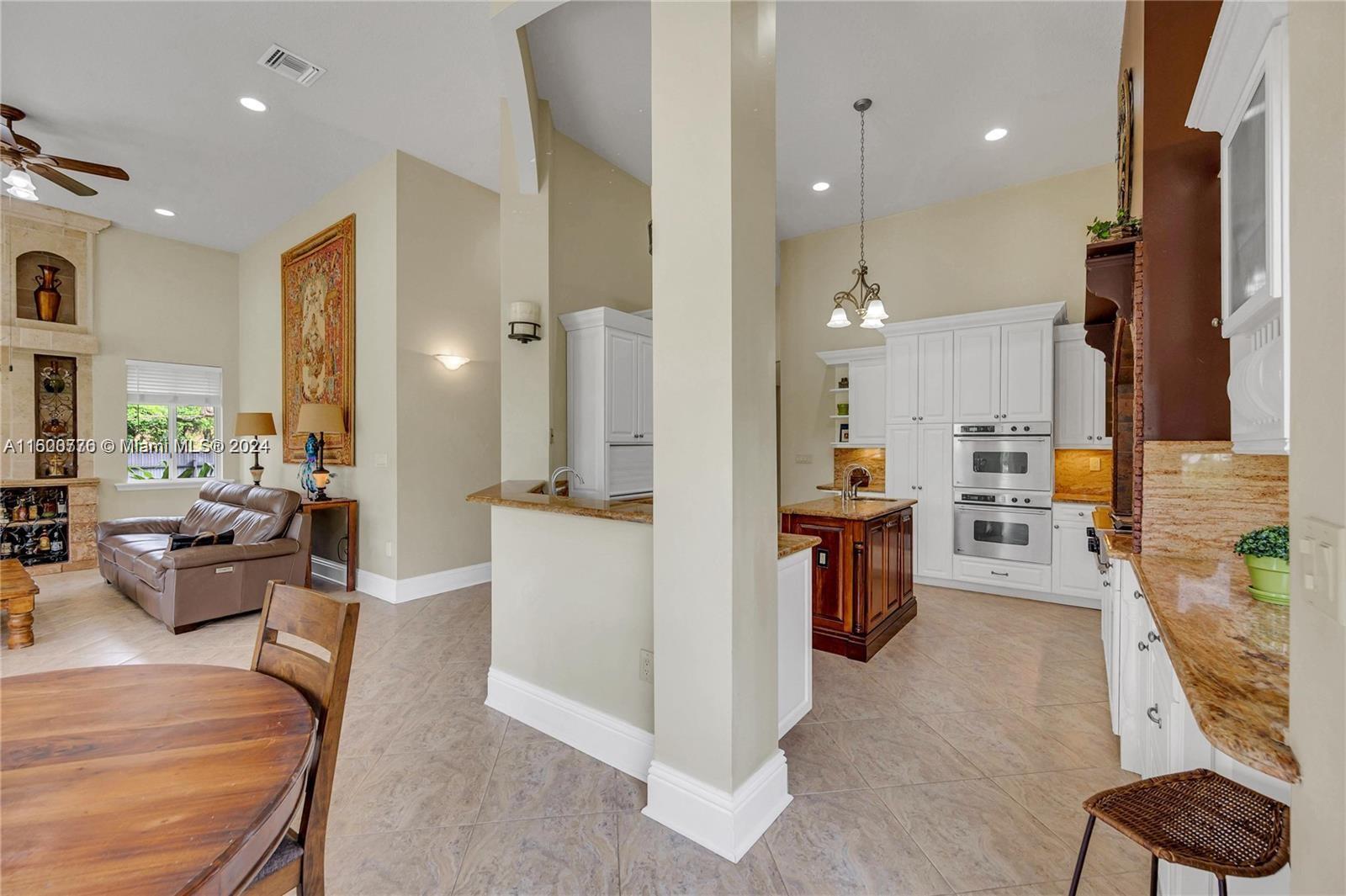 10901 Southwest 91st Street Miami, FL 33176 - Photo 14 of 69 a living room with furniture and a large window
