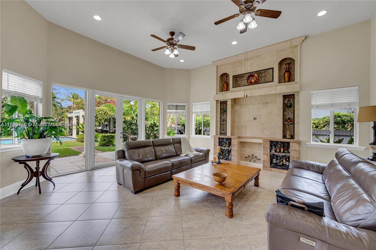 10901 Southwest 91st Street Miami, FL 33176 - Photo 19 of 69 a living room with furniture and a large window