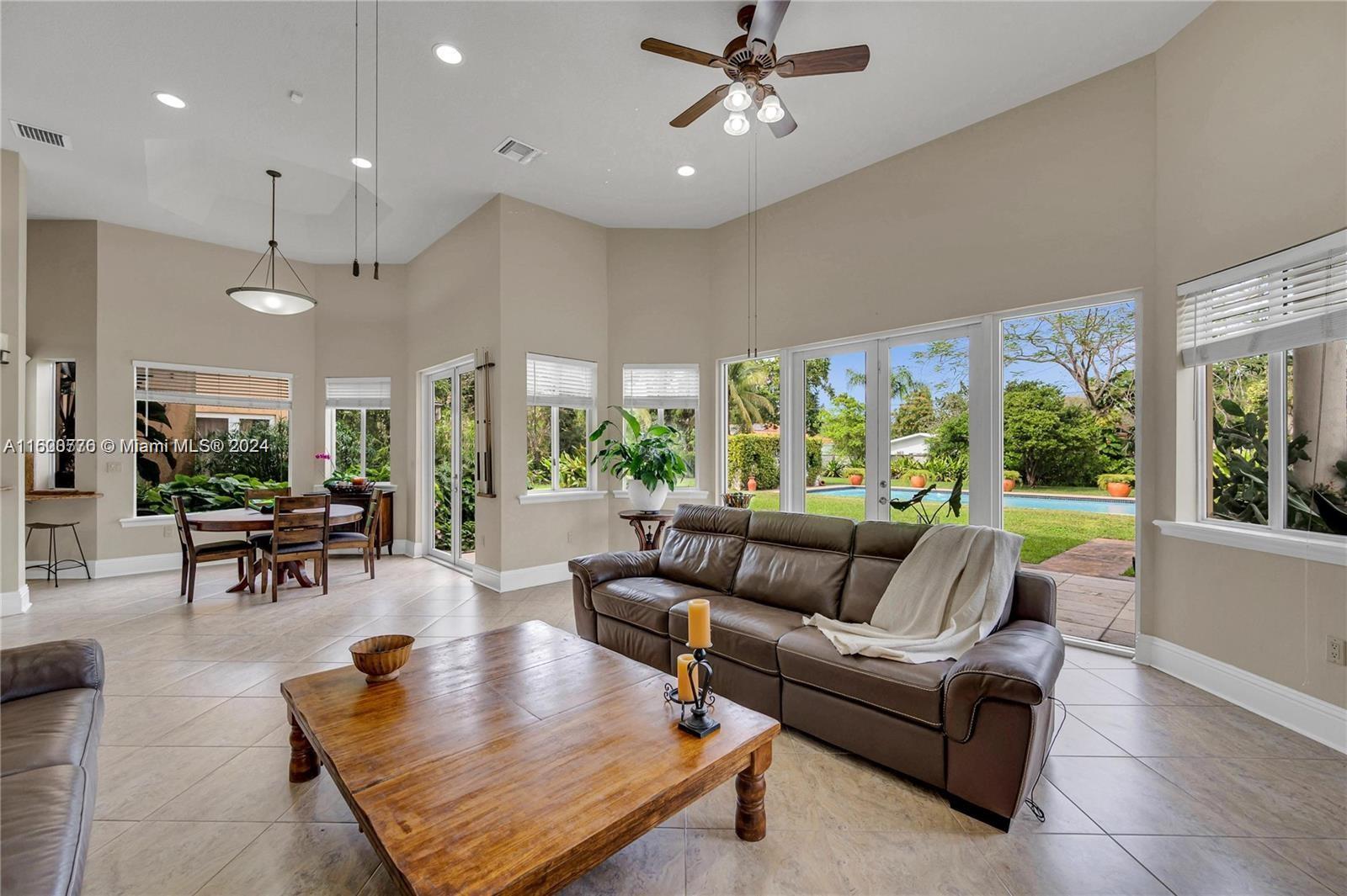 10901 Southwest 91st Street Miami, FL 33176 - Photo 20 of 69 a living room with furniture and a large window