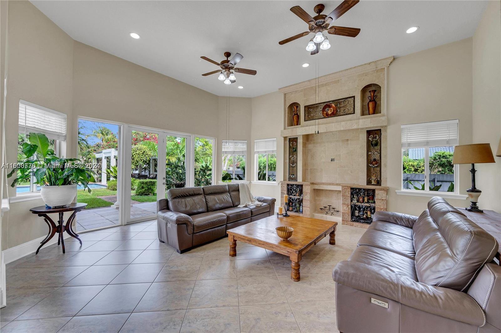 10901 Southwest 91st Street Miami, FL 33176 - Photo 21 of 69 a living room with furniture and a large window